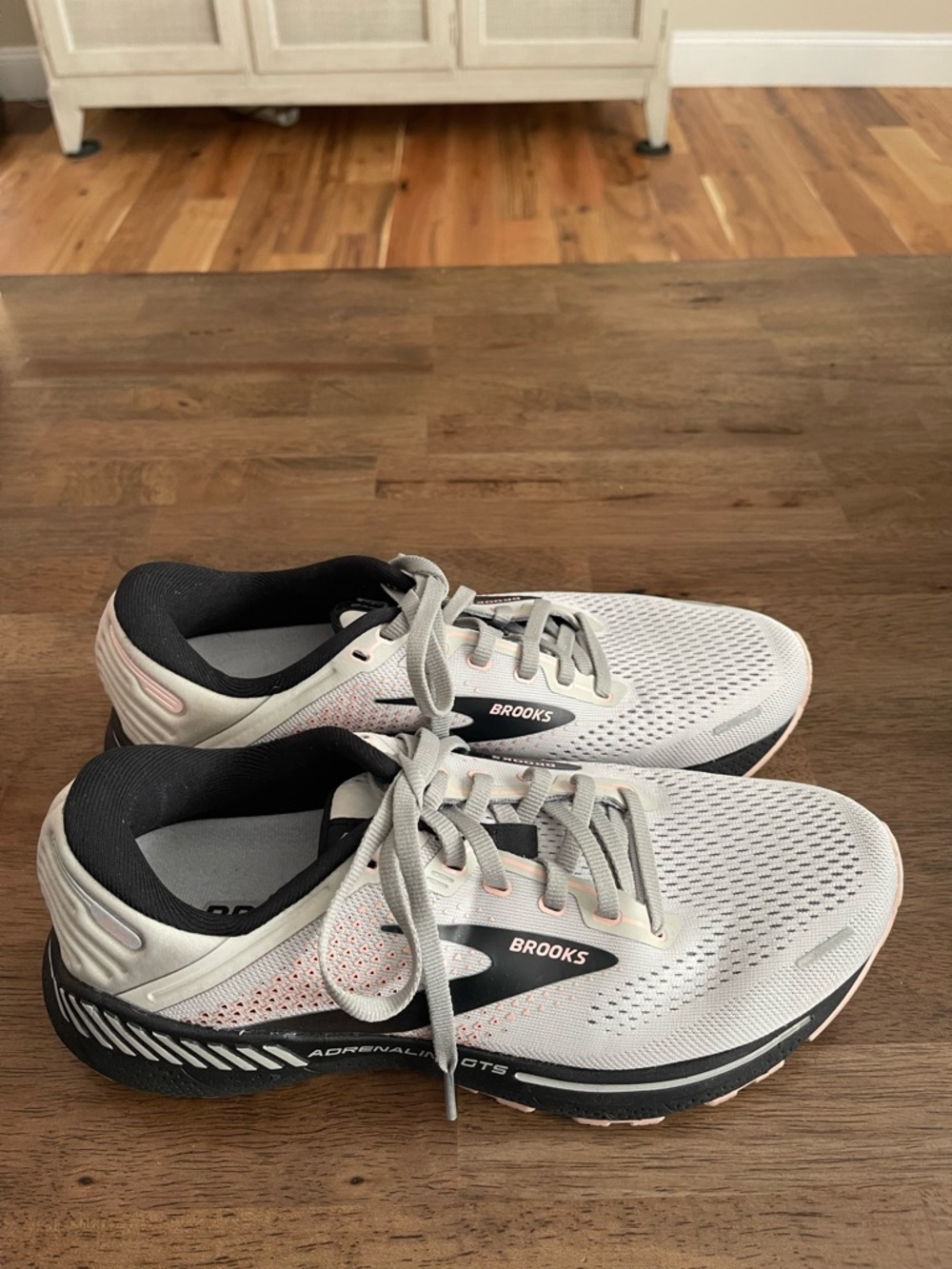 Brooks Women's Running Shoes in Light Gray with Black and Pink Accents